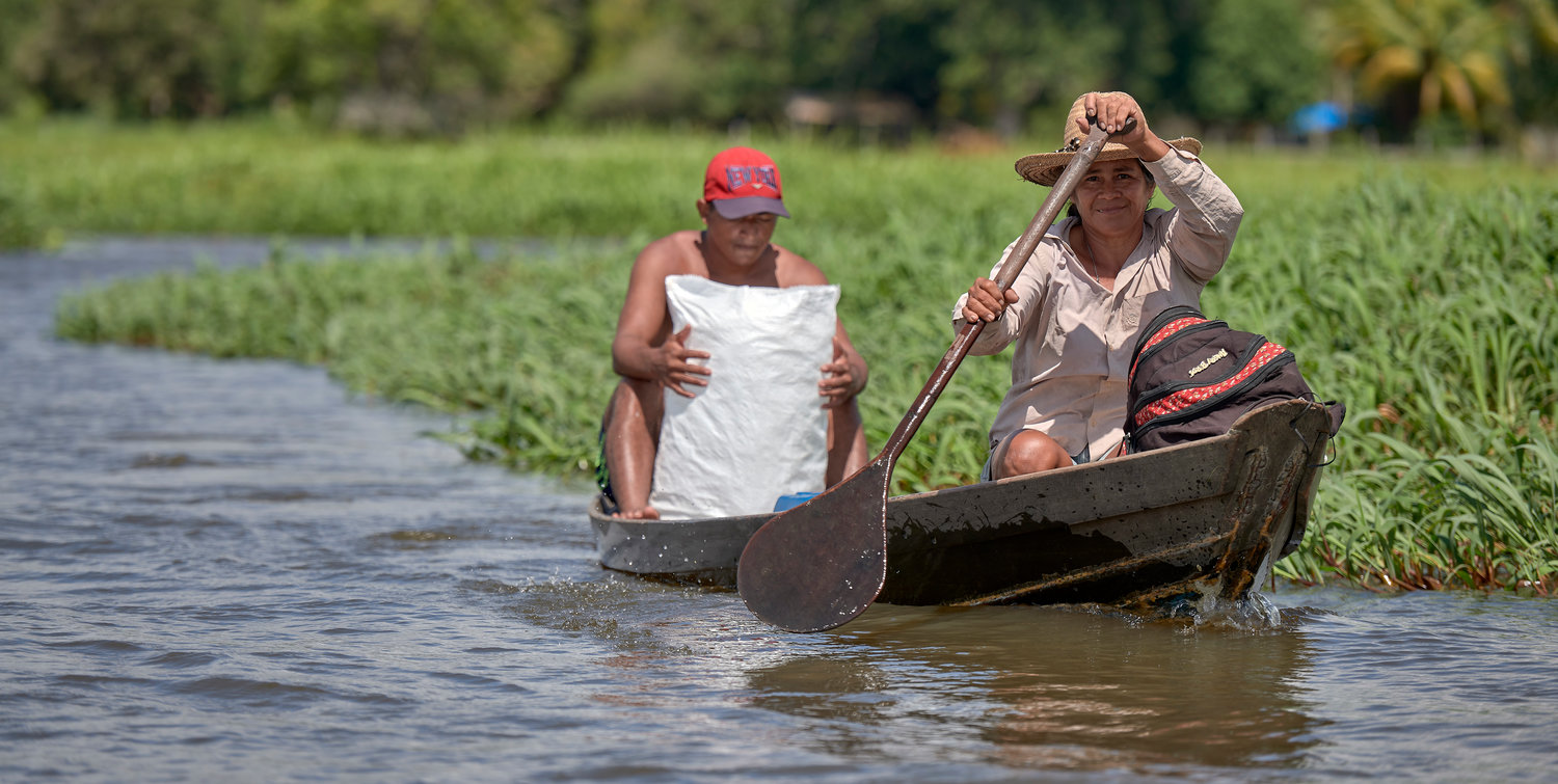 A woman paddles a canoe in Santarem, a city alongside the Amazon River in Brazil’s northern Para state, March 11, 2019. Franciscan Father Joao Messias Sousa, who works among indigenous in the Amazon, said the people believe “God is in all things, but those things are not gods.”